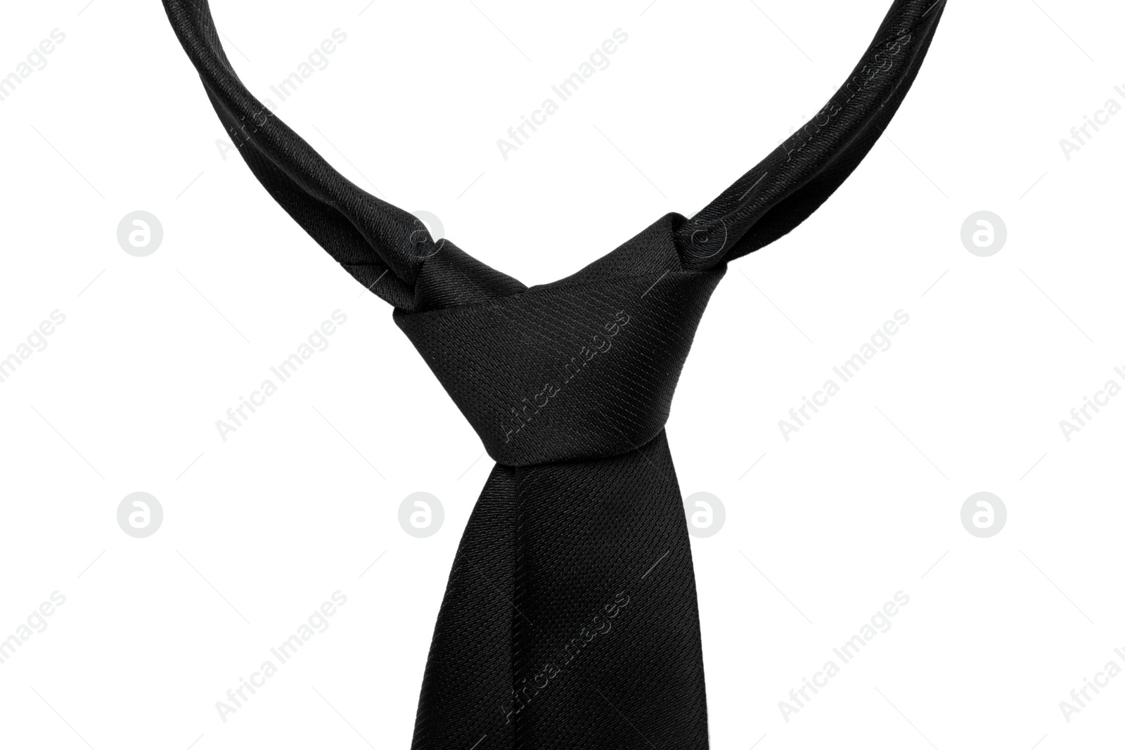 Photo of Stylish black male necktie isolated on white, closeup