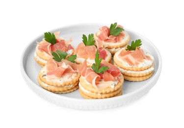 Photo of Delicious crackers with cream cheese, prosciutto and parsley on white background