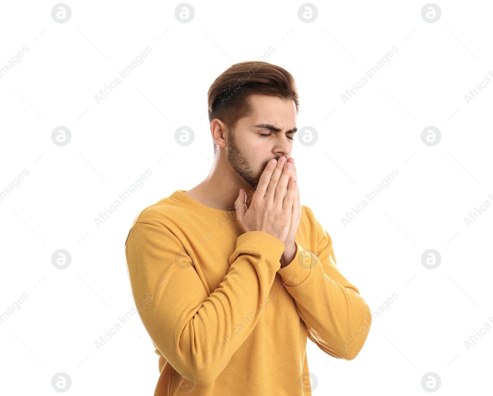 Photo of Handsome young man coughing against white background