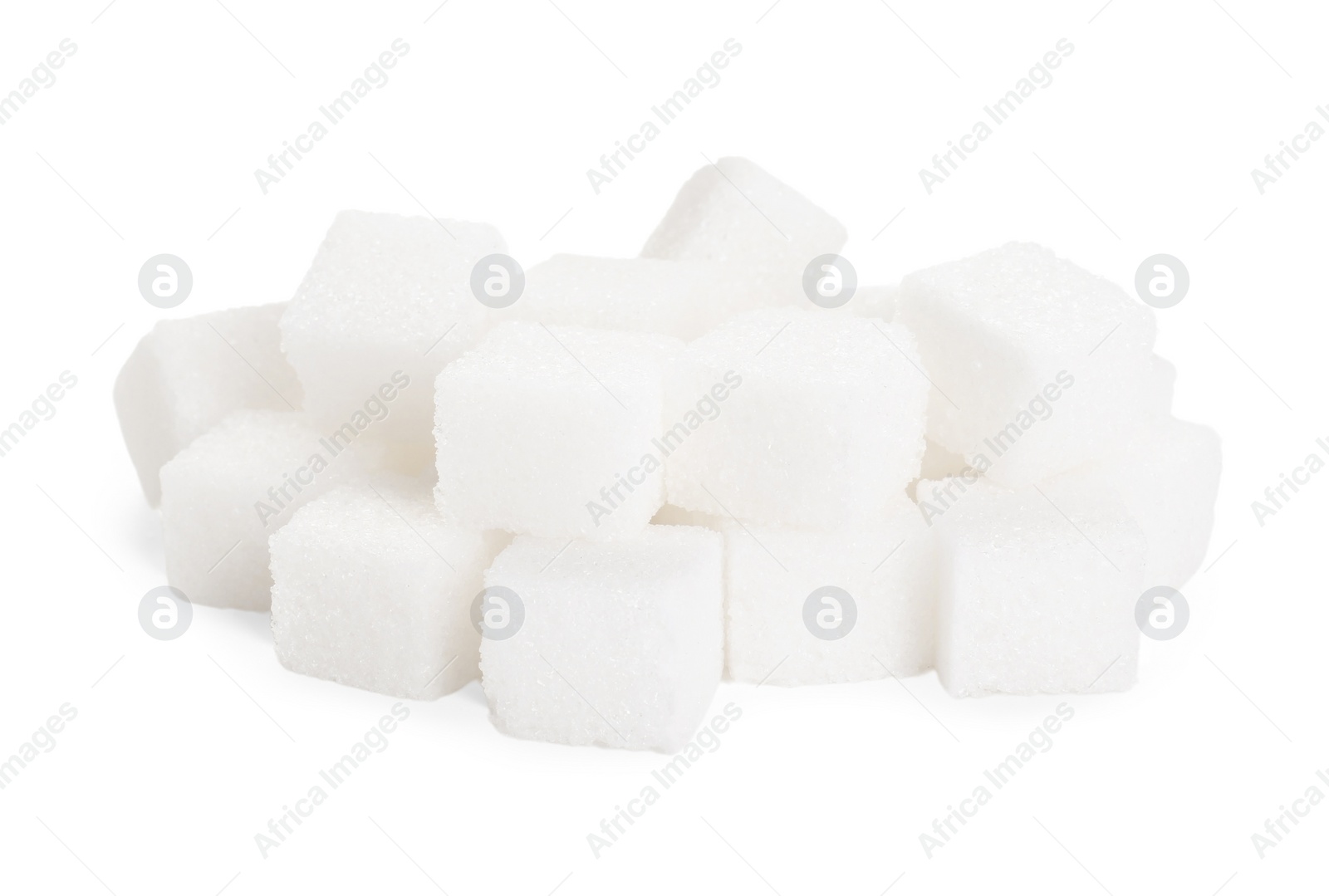 Photo of Pile of sugar cubes isolated on white