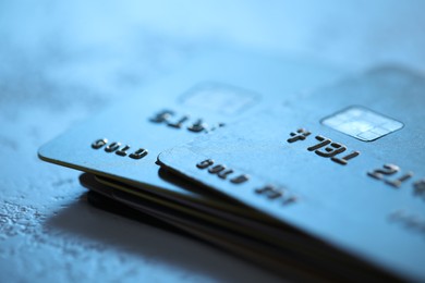 Plastic credit cards on table, macro view