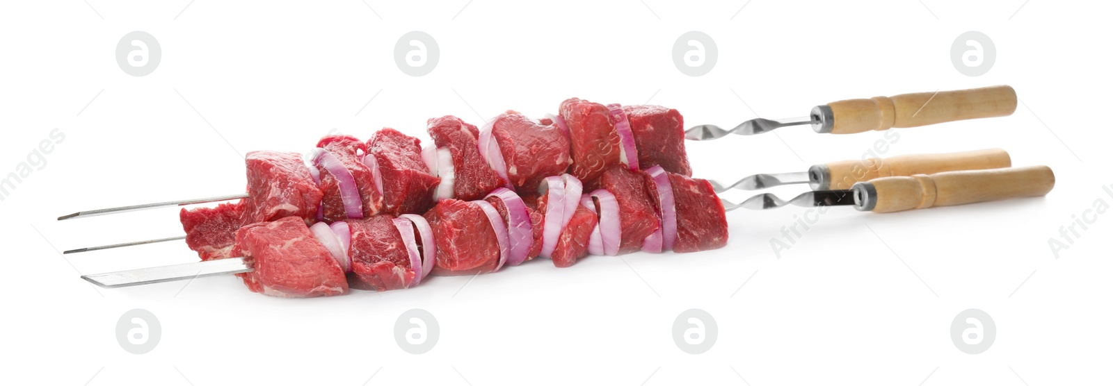 Photo of Metal skewers with raw meat and onion on white background