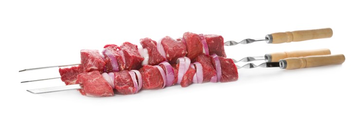 Photo of Metal skewers with raw meat and onion on white background