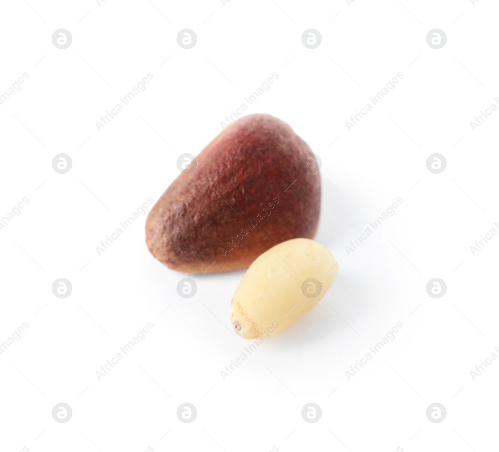 Photo of Pine nuts on white background. Healthy snack