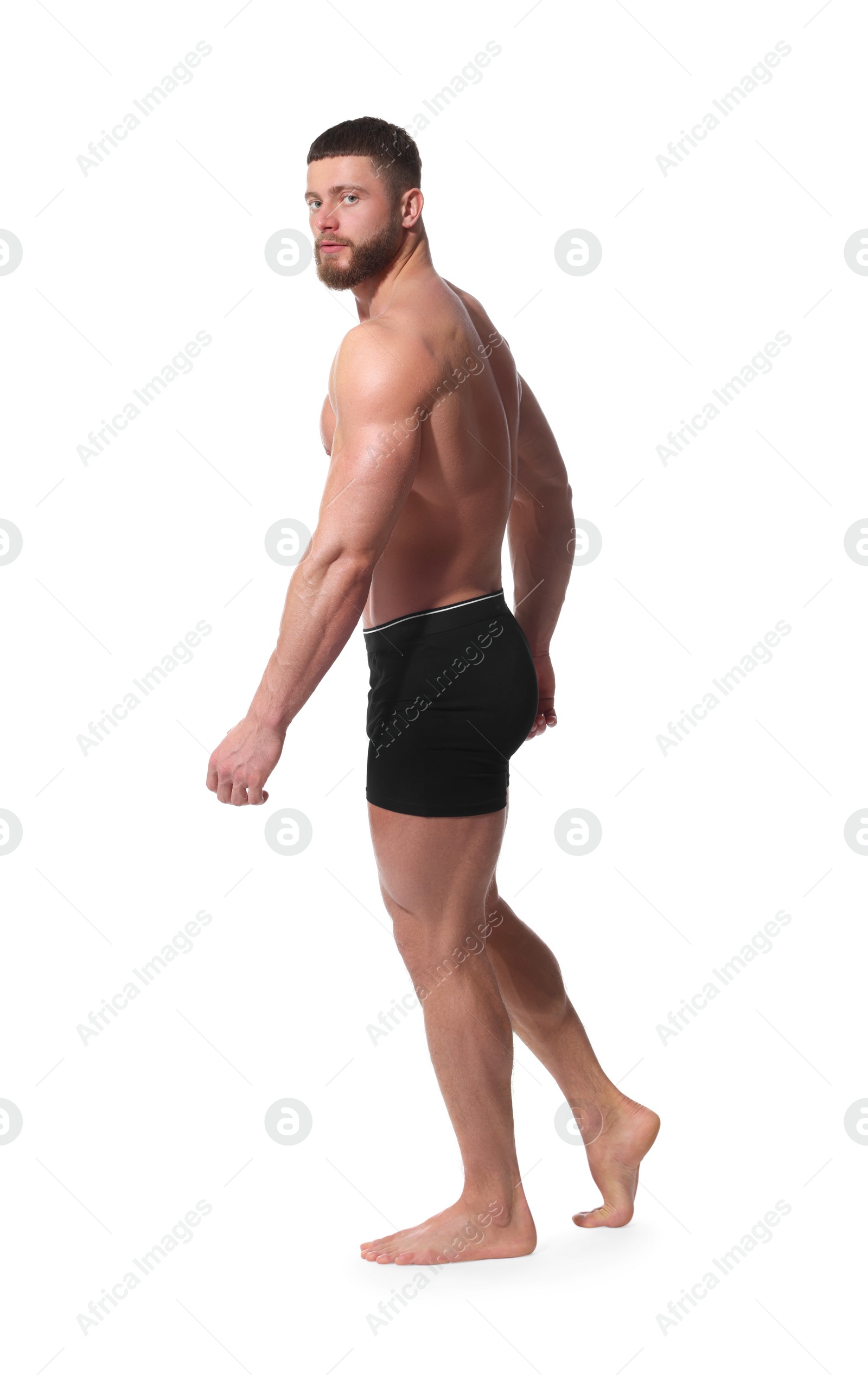 Photo of Young man is stylish black underwear on white background