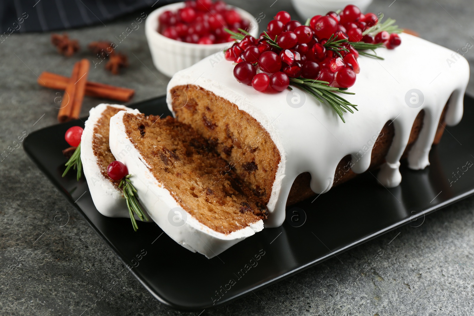 Photo of Traditional Christmas cake on grey table. Classic recipe