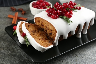 Traditional Christmas cake on grey table. Classic recipe