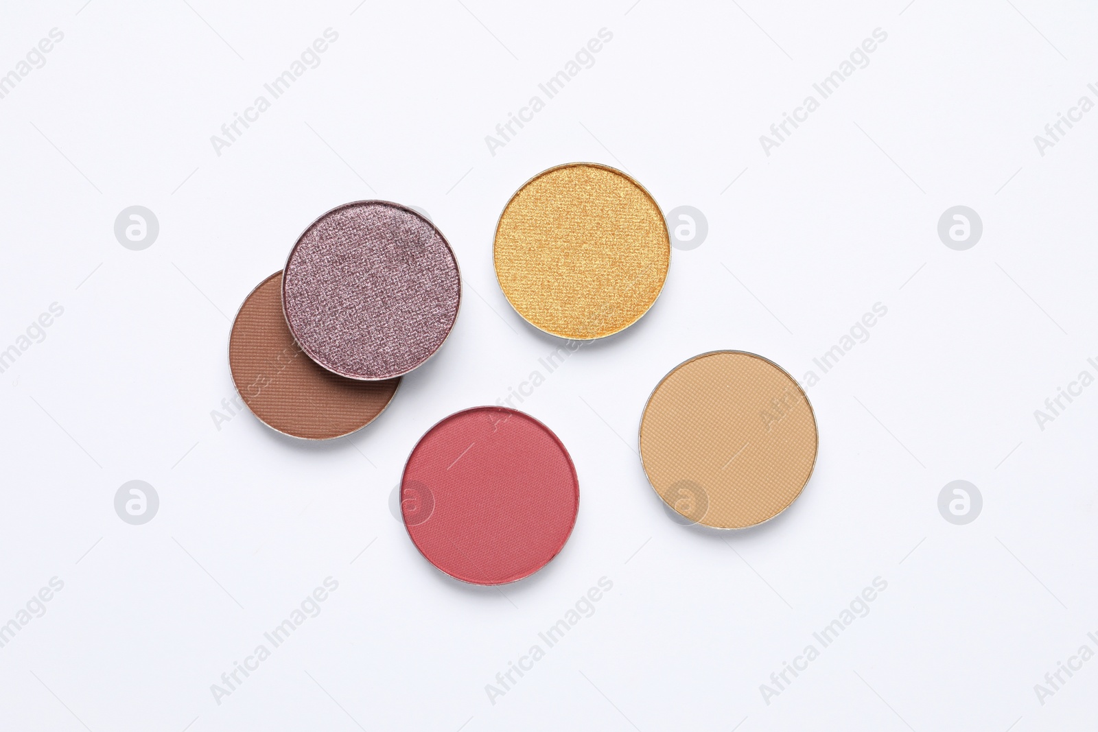 Photo of Beautiful eye shadow refill pans on white background, flat lay