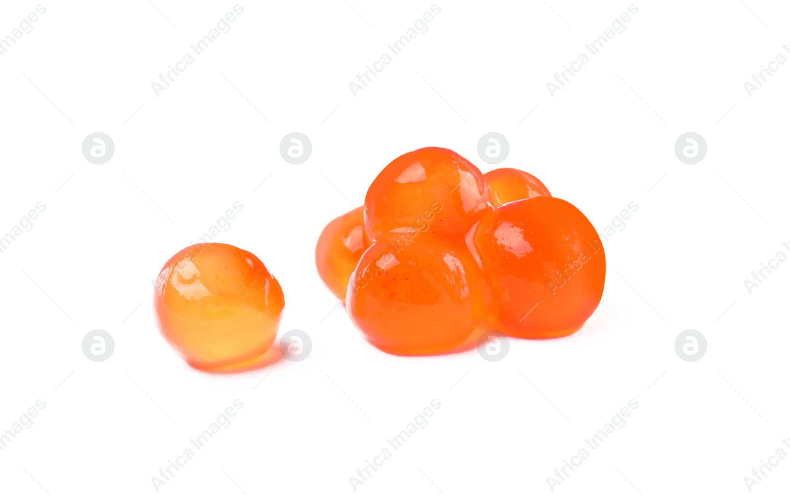 Photo of Pile of delicious red caviar isolated on white, closeup