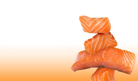 Image of Cut fresh salmon on white and orange gradient background, space for text