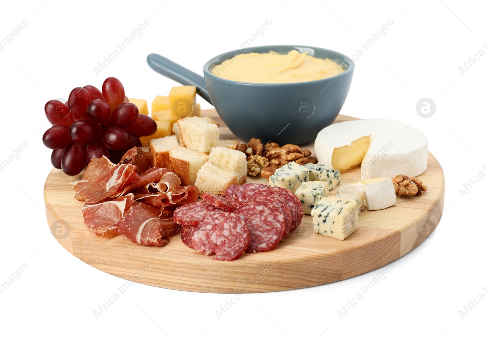 Photo of Fondue with tasty melted cheese and different snacks isolated on white