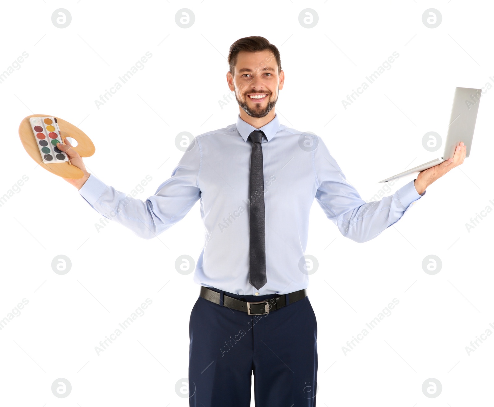 Photo of Portrait of businessman with laptop and painting materials on white background. Combining life and work