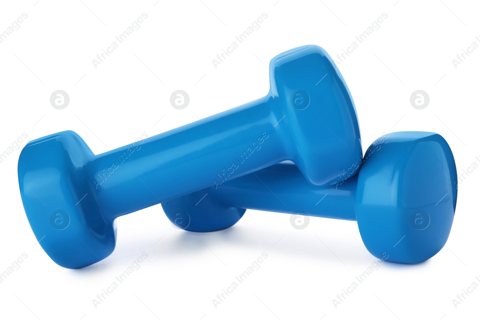 Photo of Color dumbbells on white background. Home fitness