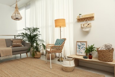 Light living room with boho decor. Interior design