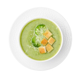 Photo of Delicious broccoli cream soup with croutons and cheese isolated on white, top view