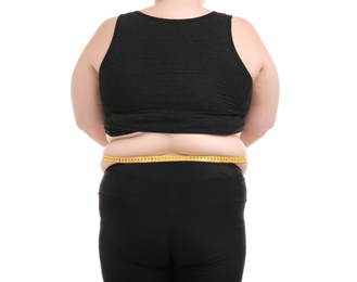 Photo of Overweight woman with measuring tape on white background