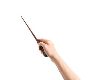 Woman holding wooden magic wand on white background, closeup