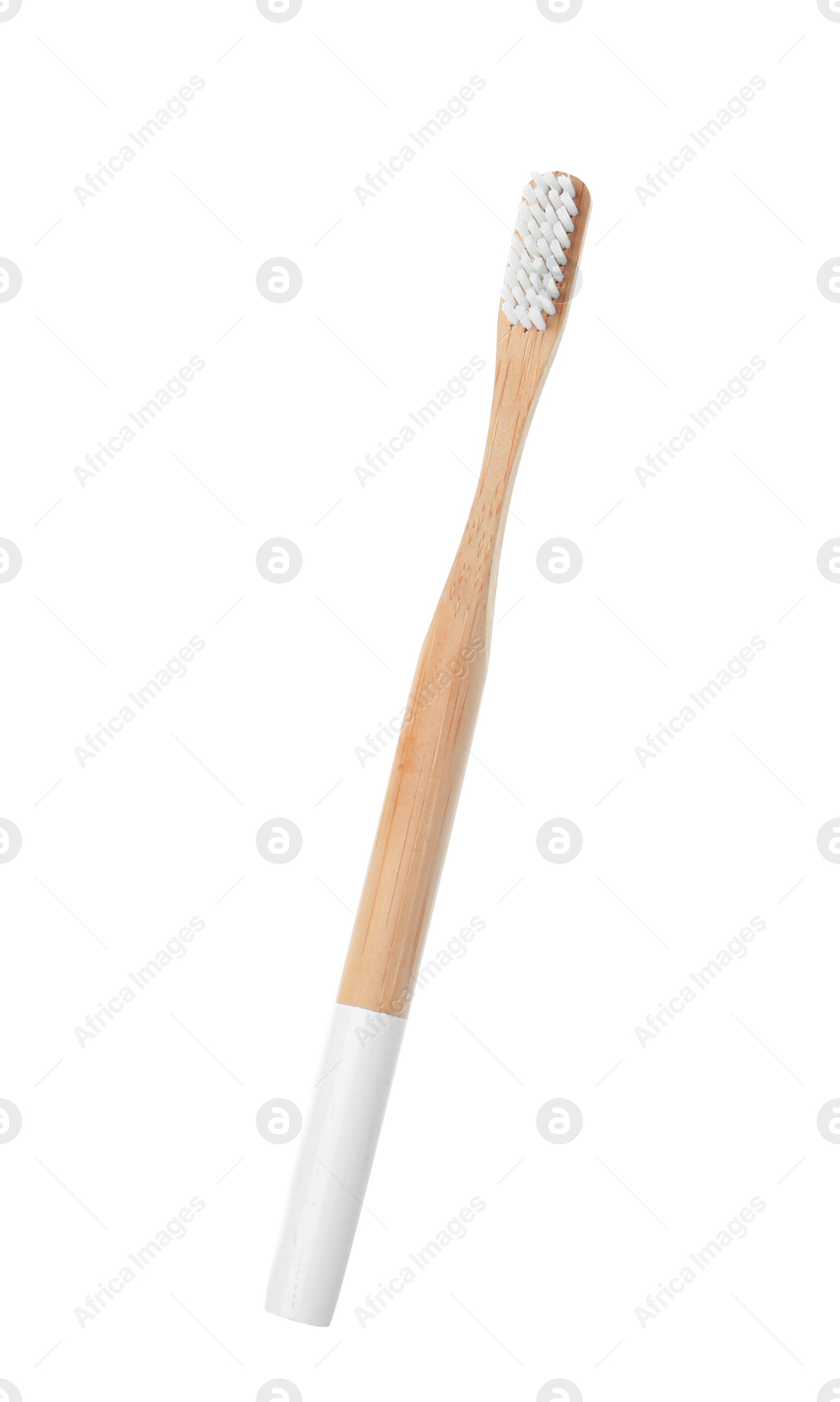 Photo of Bamboo toothbrush on white background. Dental care