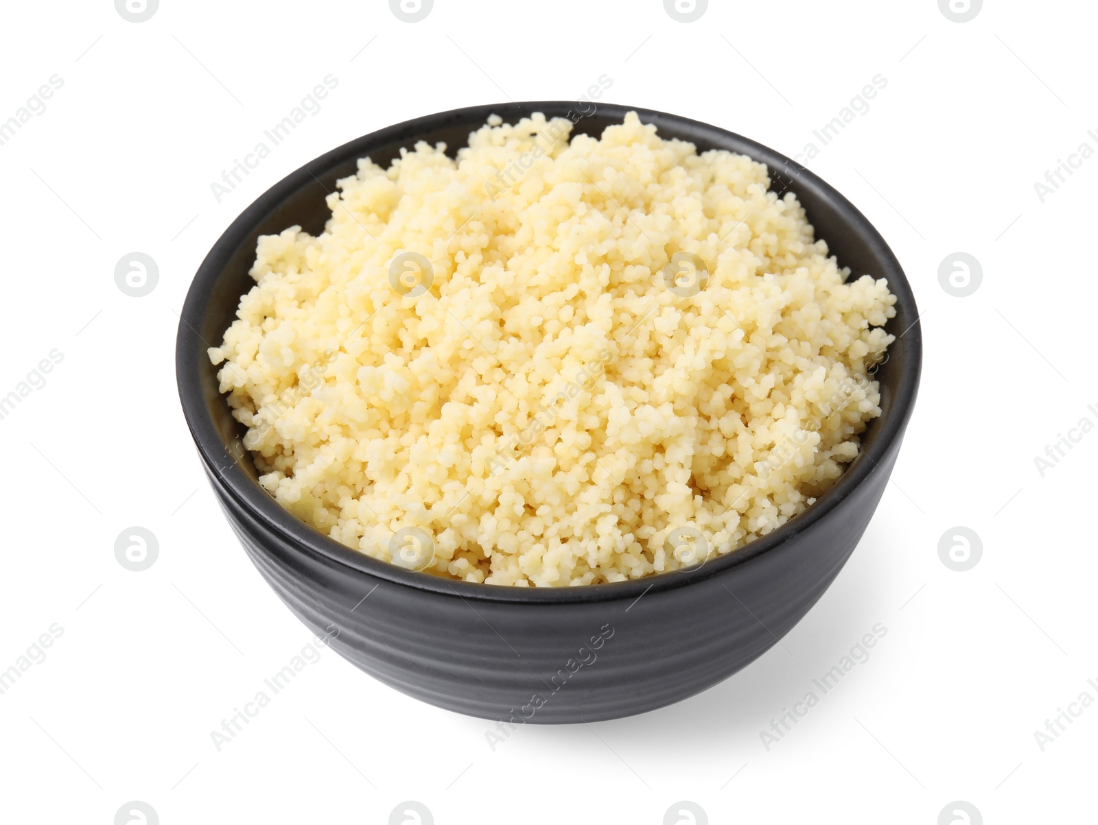 Photo of Tasty couscous in bowl isolated on white