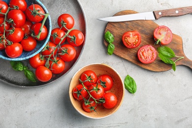 Photo of Flat lay composition with ripe tomatoes on table