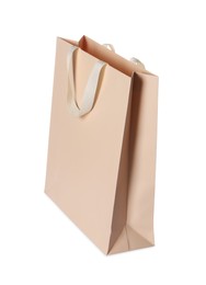 One beige shopping bag isolated on white