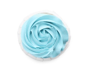 Photo of Baby shower cupcake with light blue cream isolated on white, top view