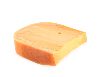 Piece of tasty mimolette cheese isolated on white