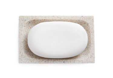 Holder with soap bar on white background, top view