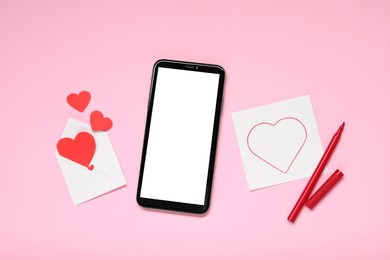 Photo of Long-distance relationship concept. Smartphone, love note and envelope with paper hearts on pink background, flat lay