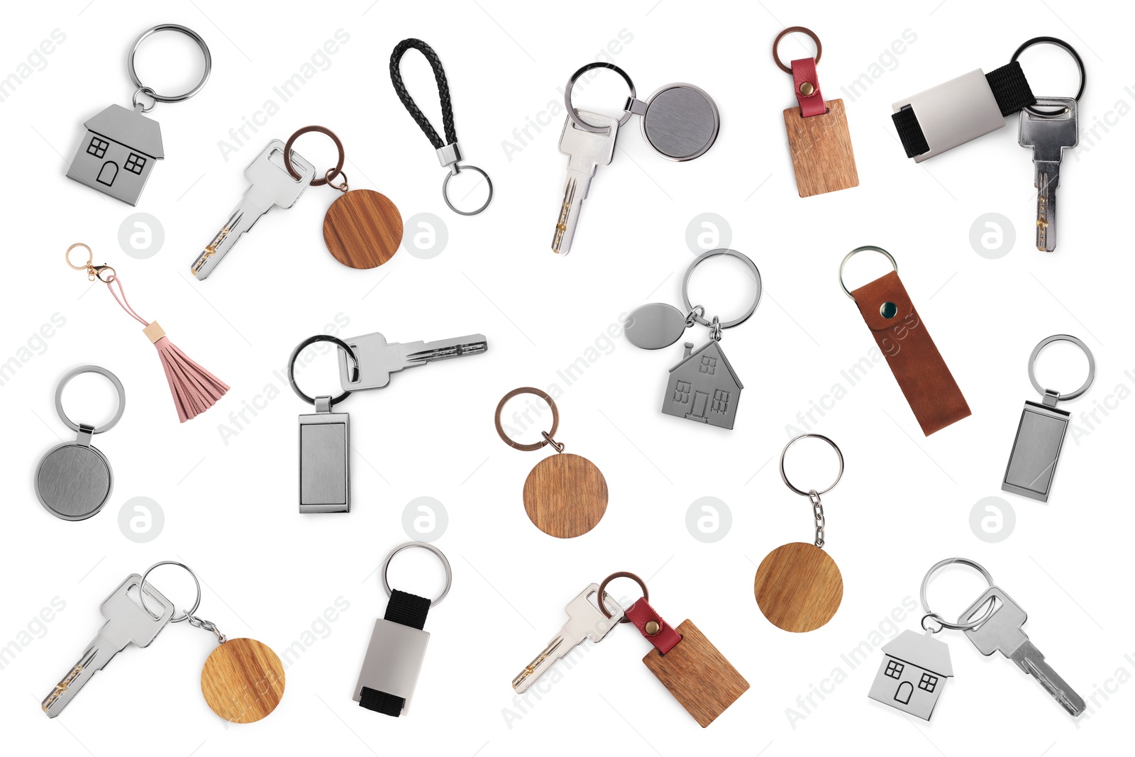 Image of Set with keys and key chains isolated on white