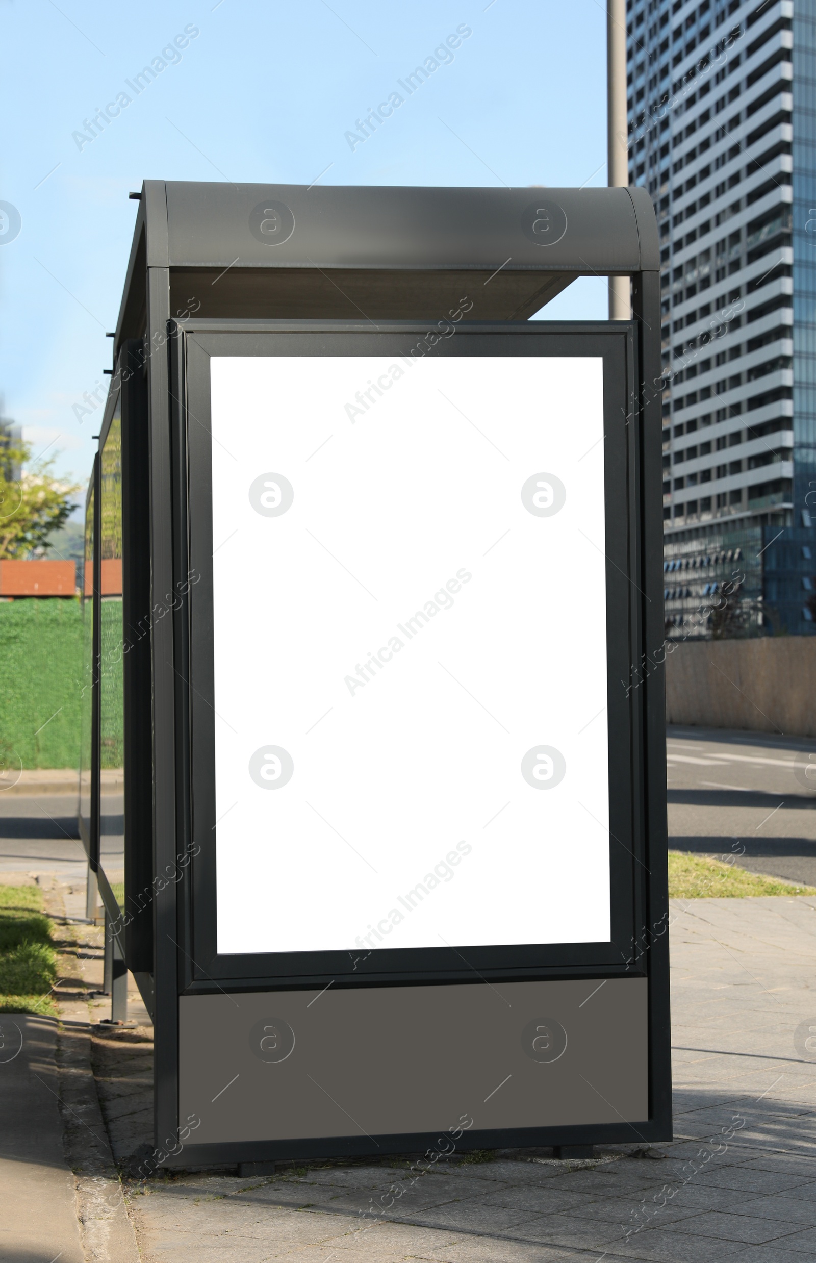 Image of Bus stop with empty signboard in city. Mock-up for design