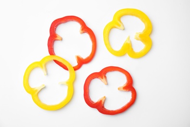 Photo of Cut ripe paprika pepper on white background, top view