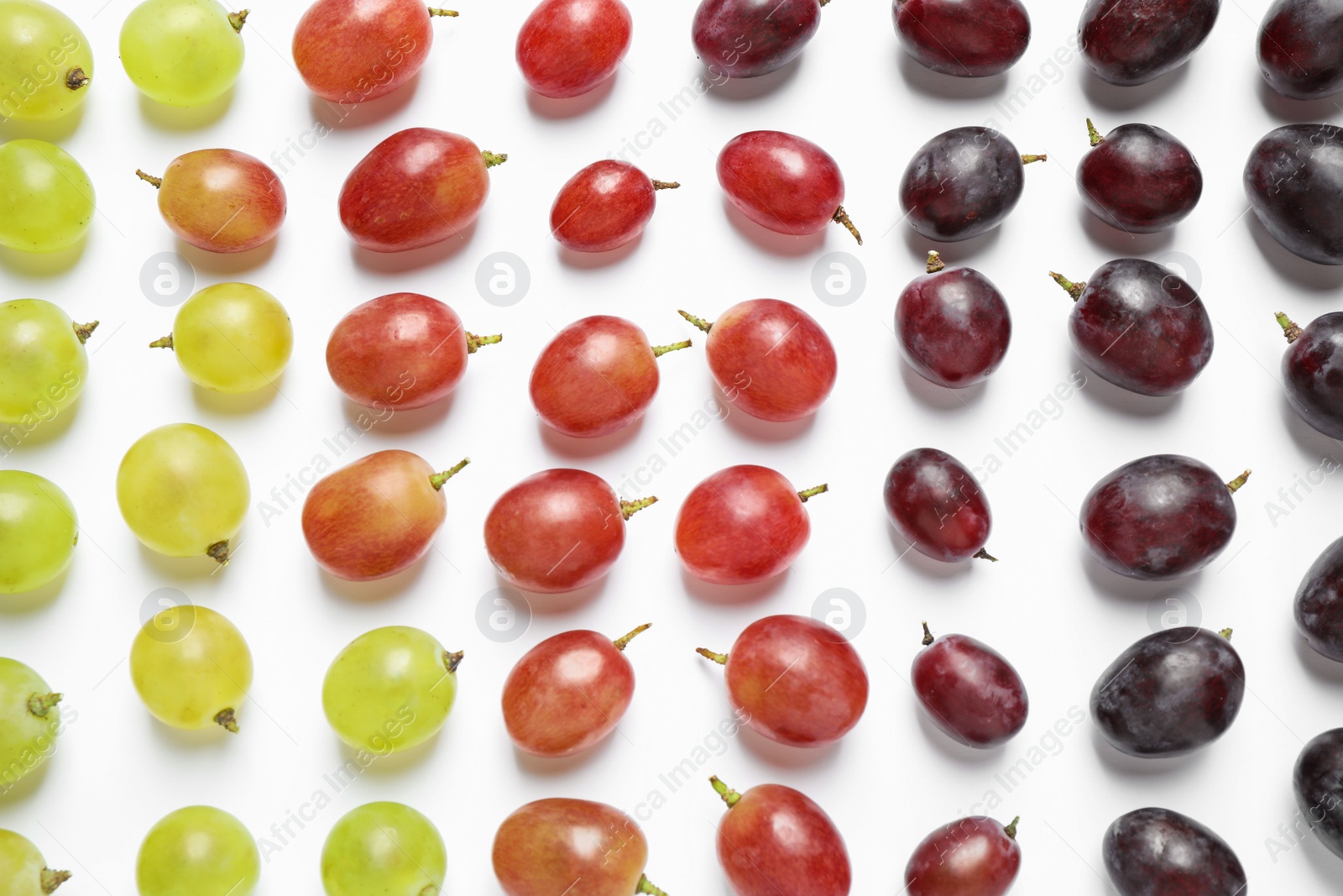 Photo of Fresh ripe juicy grapes on white background, top view