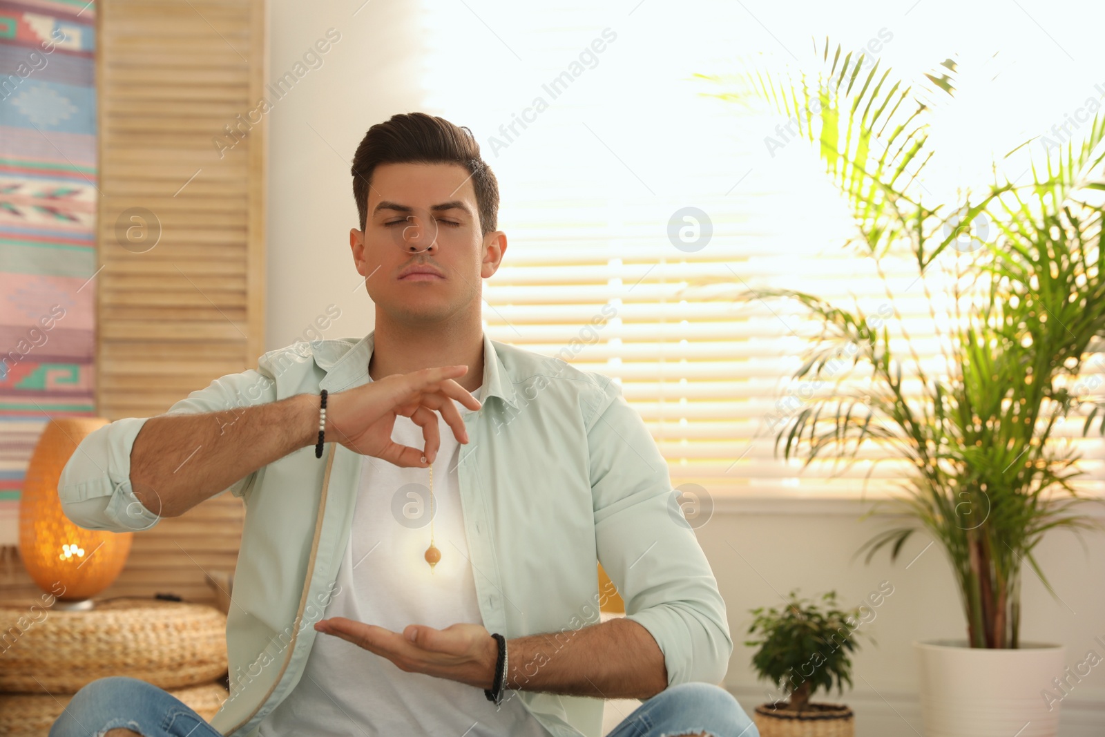 Photo of Man during self-healing session in therapy room