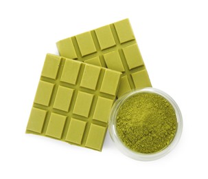 Pieces of tasty matcha chocolate bar and powder isolated on white, top view