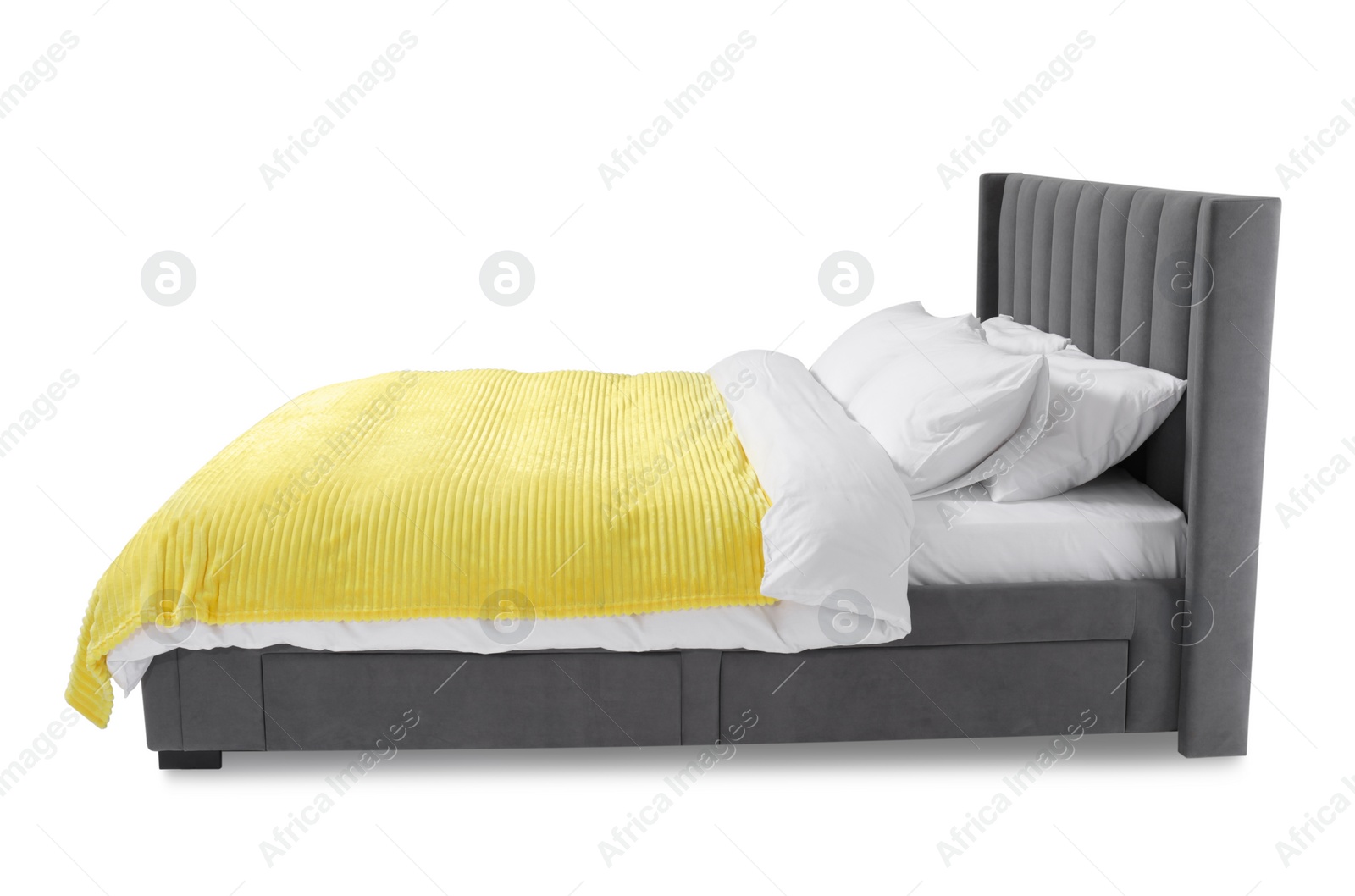 Photo of Comfortable gray bed with linens on white background