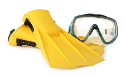 Photo of Pair of yellow flippers and mask on white background