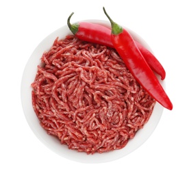 Photo of Fresh raw minced meat and chili peppers on white background, top view