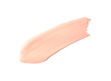 Photo of Stroke of pink color correcting concealer isolated on white