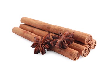 Aromatic cinnamon sticks and anise stars isolated on white