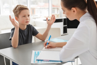 Little boy having appointment at child psychologist office