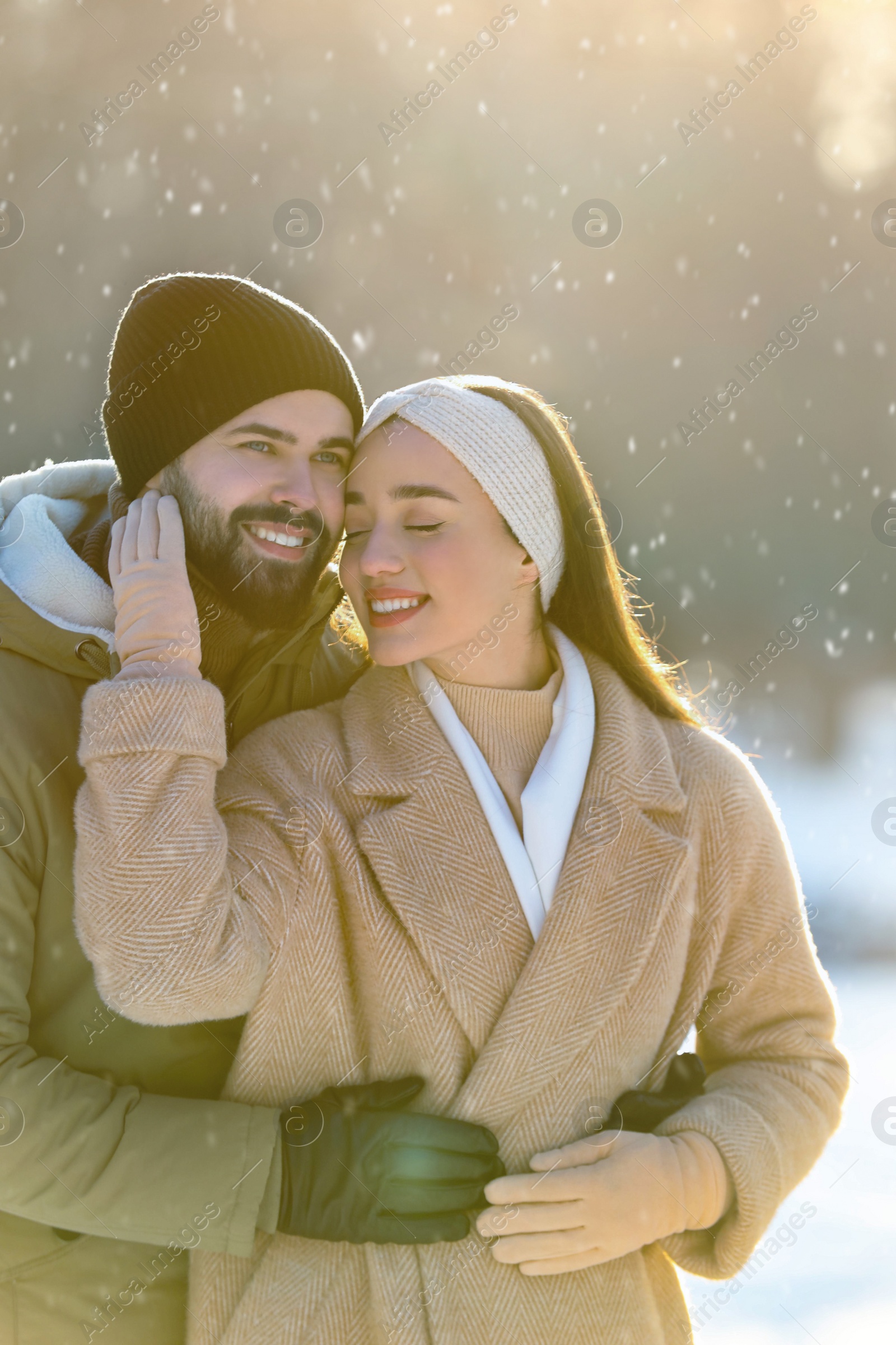 Photo of Beautiful young couple enjoying winter day outdoors