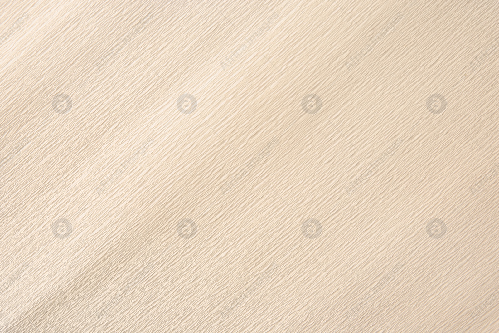 Photo of Texture of beige paper sheet as background, closeup