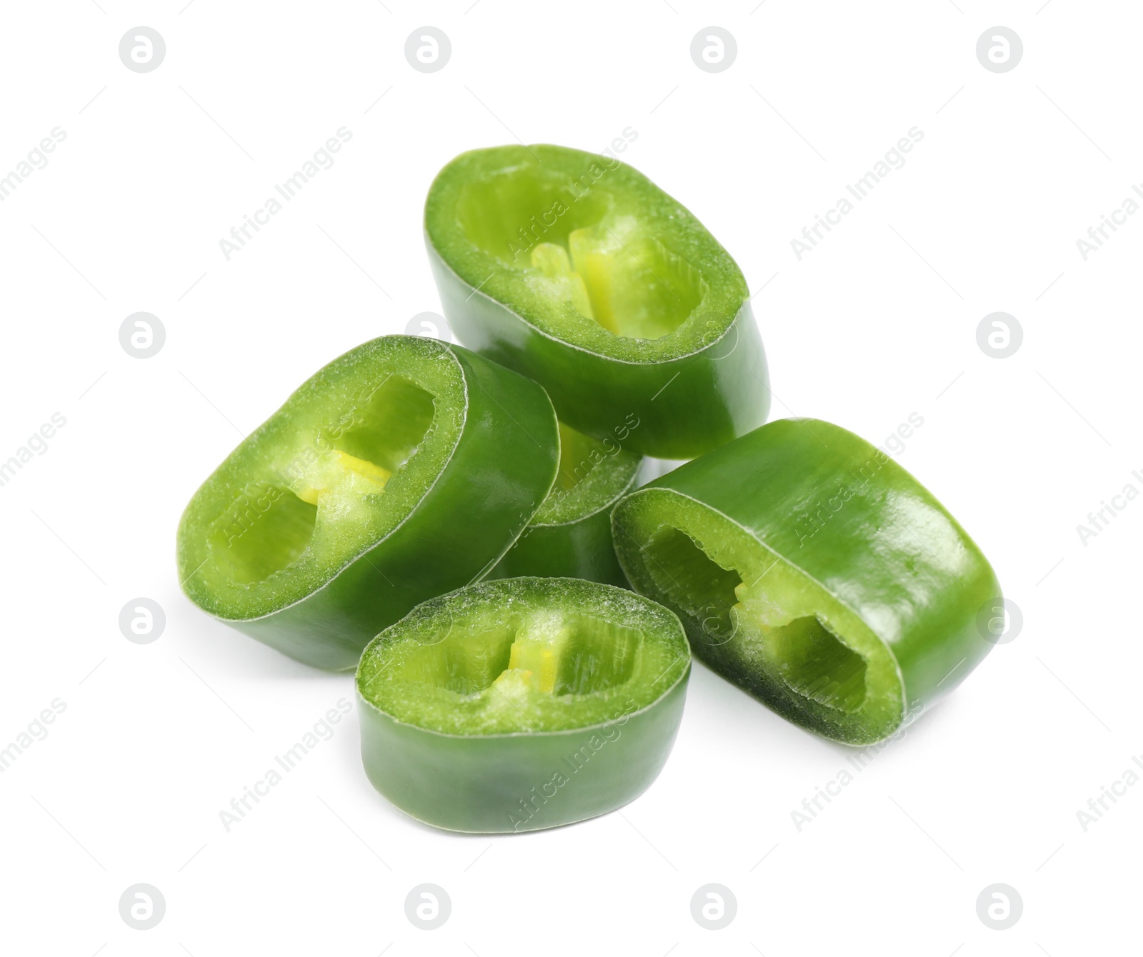 Photo of Cut green hot chili pepper on white background