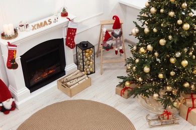 Photo of Beautiful Christmas tree and decor in living room, above view. Interior design