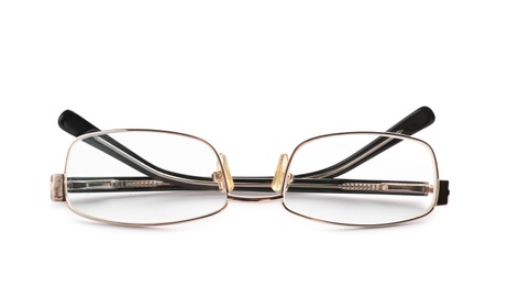 Photo of Glasses with corrective lenses on white background. Vision problem