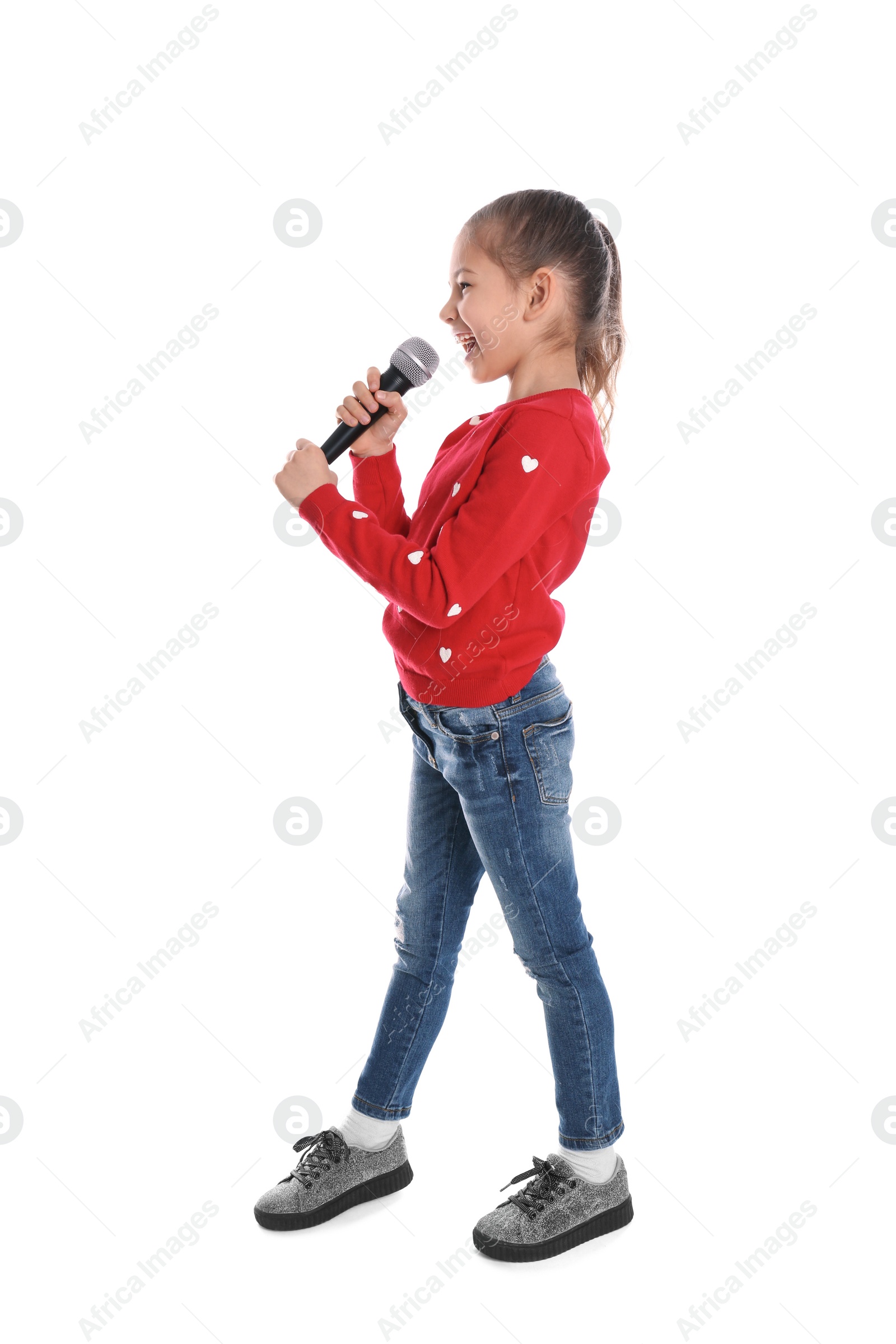 Photo of Cute funny girl with microphone on white background