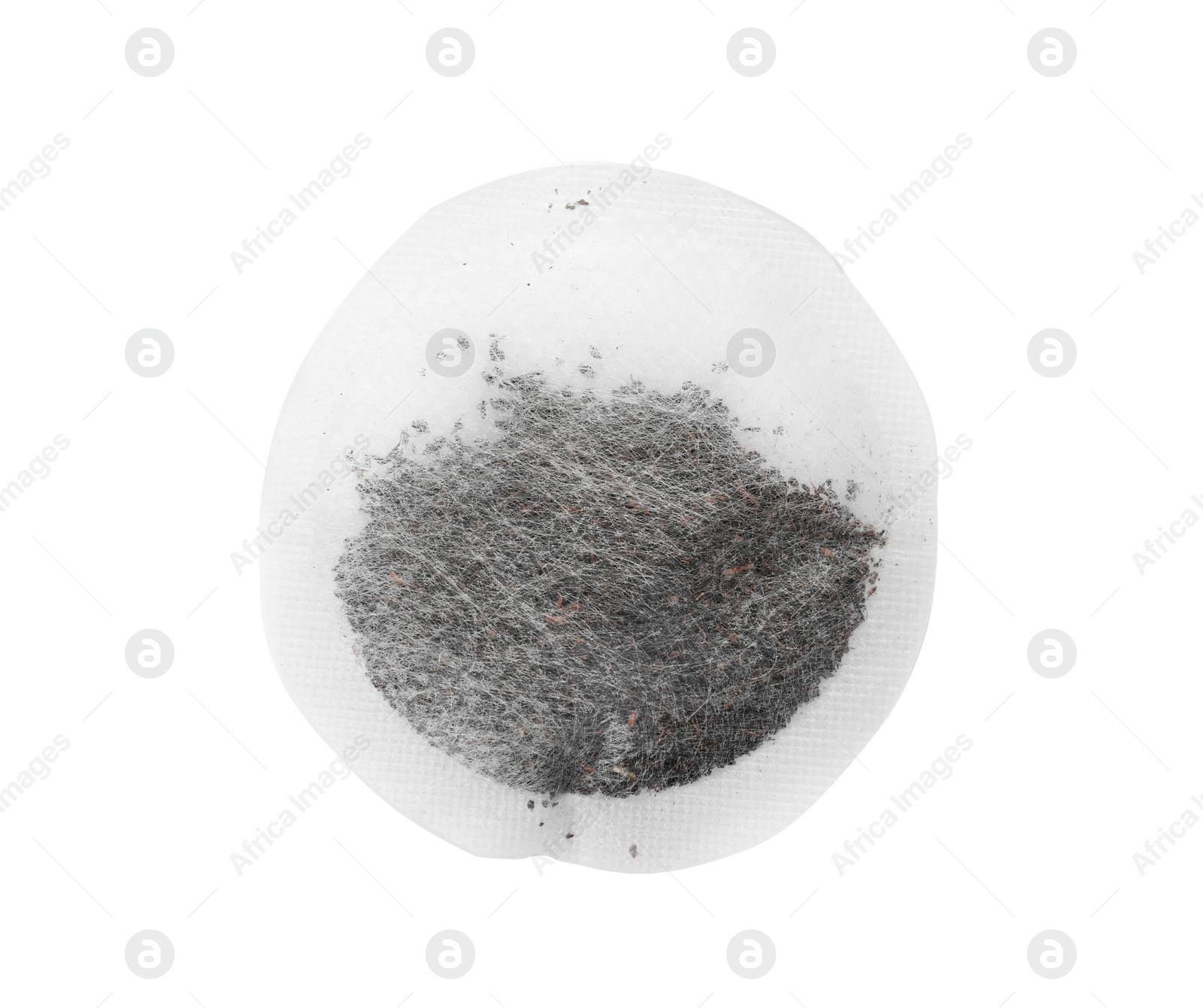 Photo of Unused round tea bag on white background