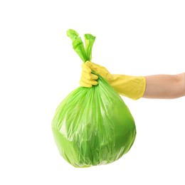 Photo of Woman holding plastic bag full of garbage on white background, closeup