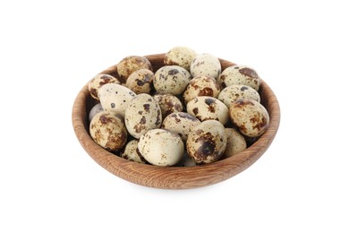 Photo of Wooden bowl with quail eggs and straw isolated on white